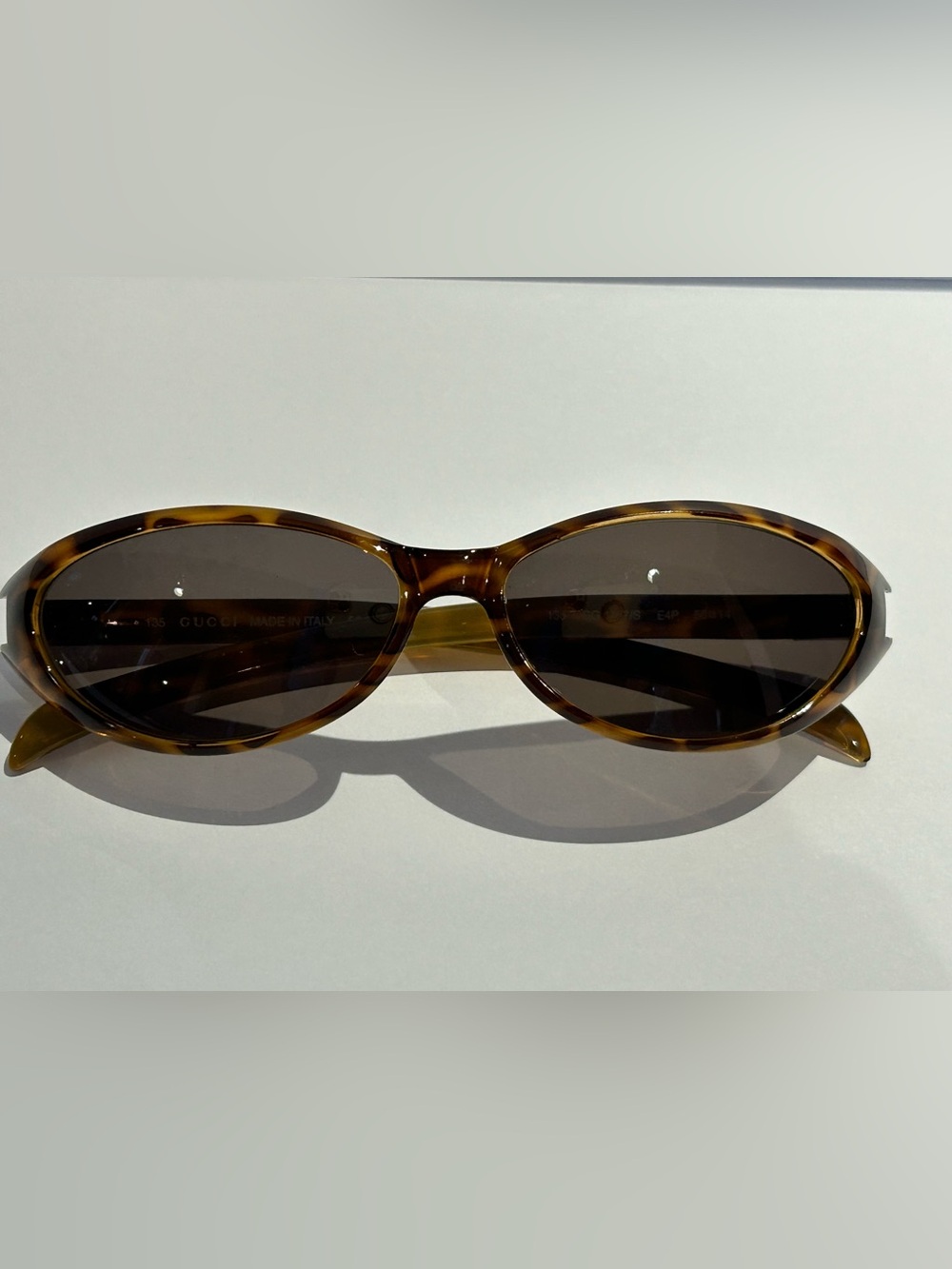 Gucci Tortoiseshell Oval Sunglasses with Brown Lenses